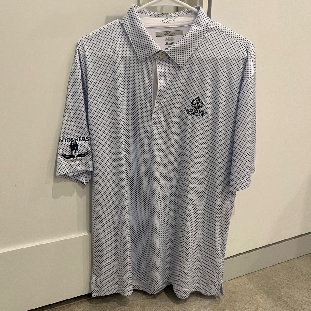 GREG NORMAN - Men’s Sz L White Pattern Jacaranda GC Golf Polo w/ Funny Arm Logo